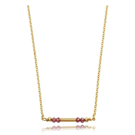 Elegant gold necklace with pink bead accents on a minimalist chain, perfect for a stylish look.