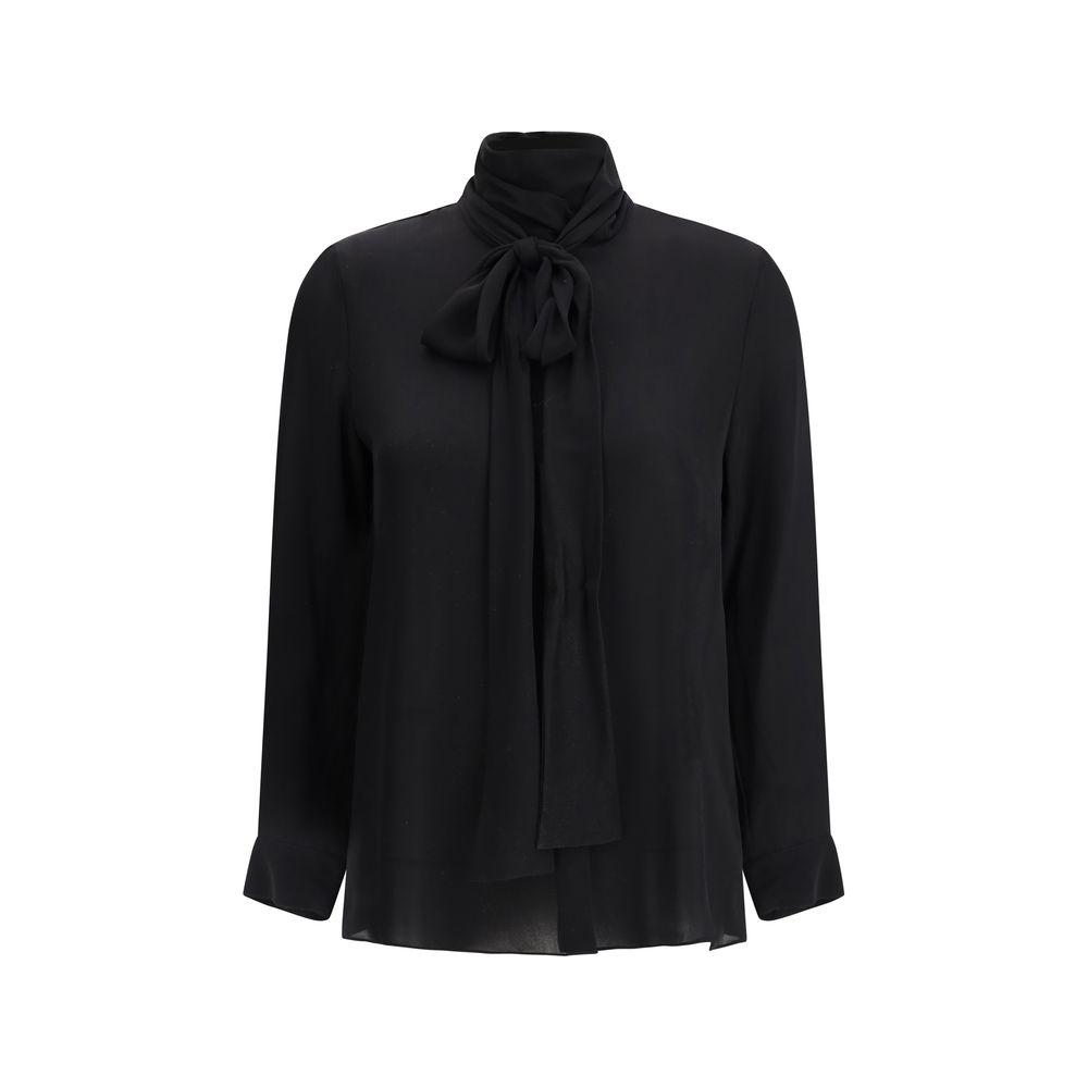Khaite Tash Silk Shirt in black with concealed button front and self-tie sash collar, featuring adjustable cuffs and semi-sheer design.