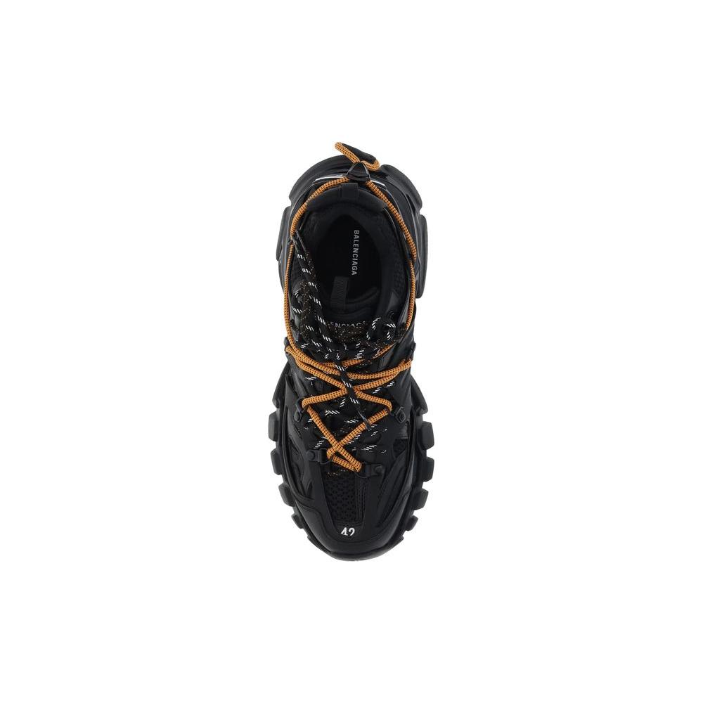 Top view of Balenciaga Track Trail Laces Sneakers in black with orange double knotted laces and embossed logos for sporty style.