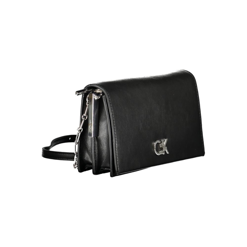 Calvin Klein Black Polyester Handbag with adjustable shoulder strap, compartments, and twist closure, made of 50% recycled polyester.
