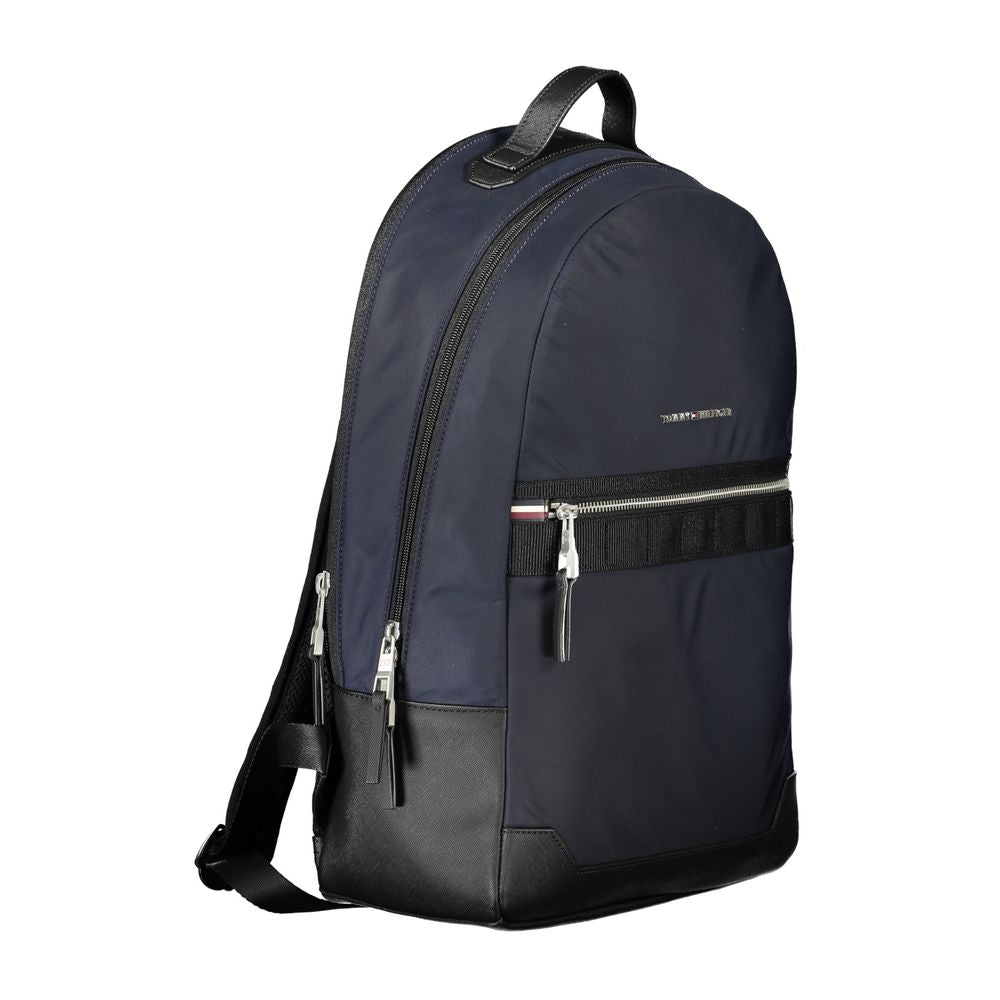 Tommy Hilfiger Blue Polyester Backpack with handle, adjustable straps, external pocket, laptop compartment, contrast details, and logo.