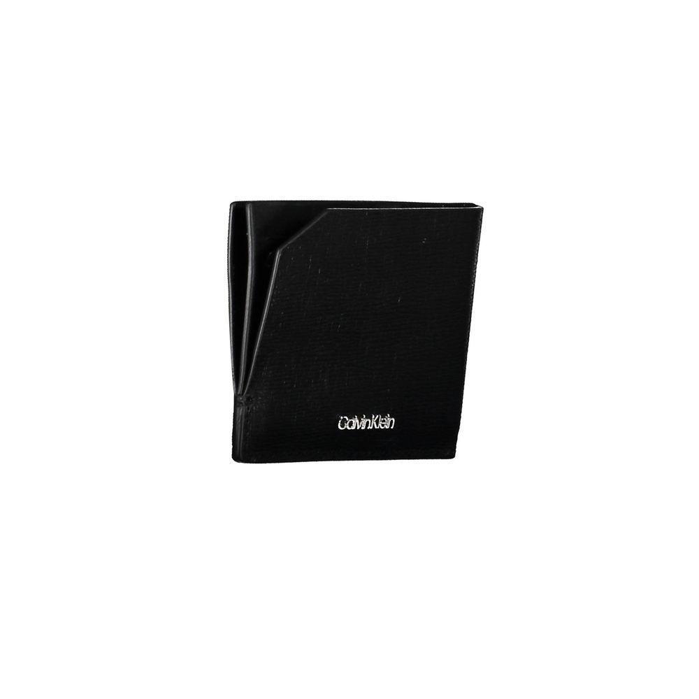 Calvin Klein Black Leather Wallet with RFID block, 2 compartments, card spaces, contrast details, and logo.