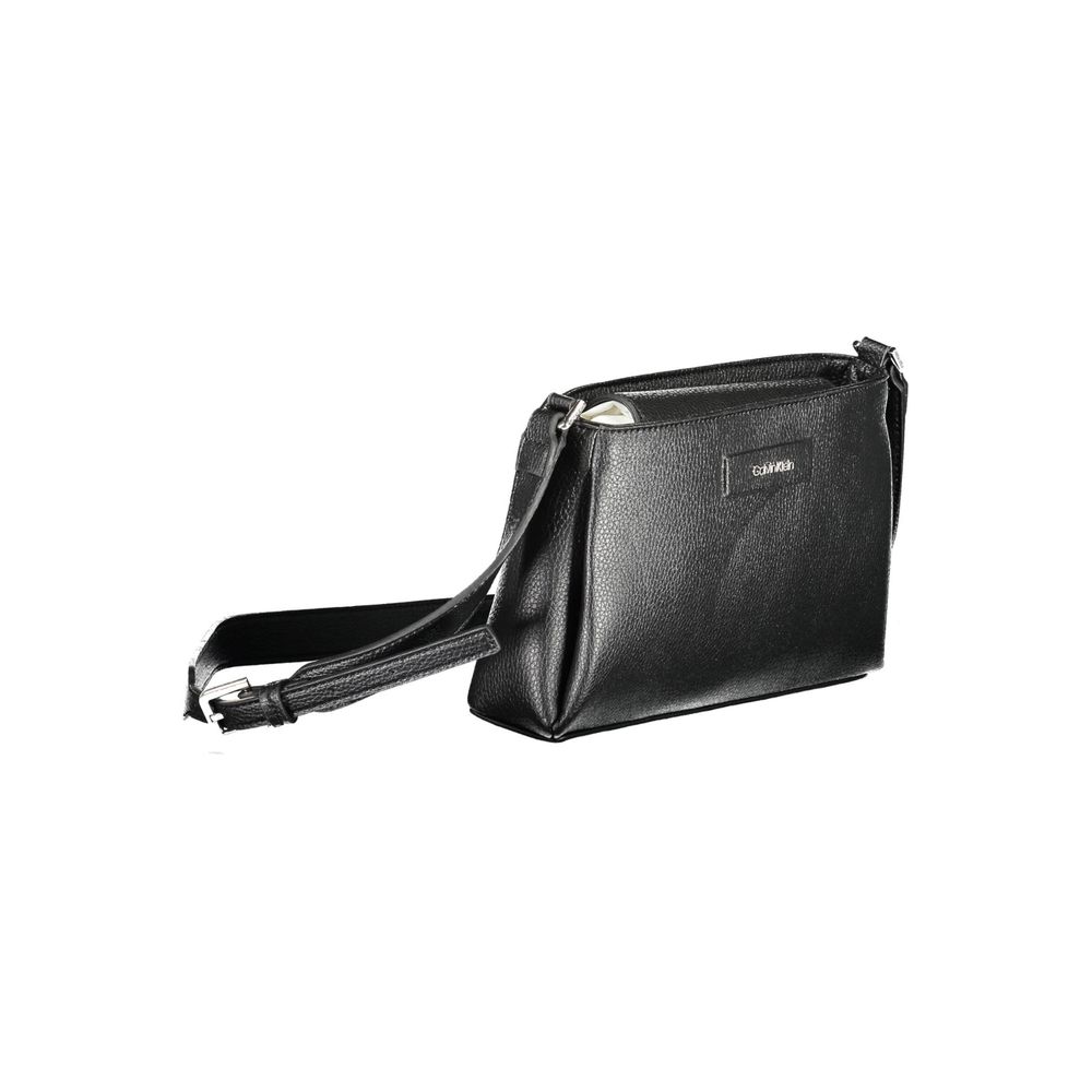 Calvin Klein Black Polyester Handbag with adjustable shoulder strap, featuring logo, and multiple pockets for versatile use.