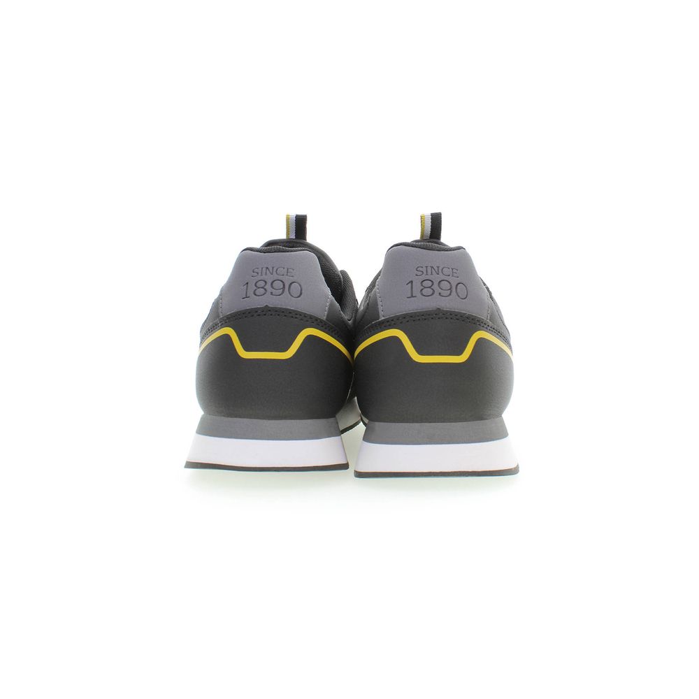 Rear view of U.S. POLO ASSN. Black Polyester Sneaker showing yellow detailing and logo on heel