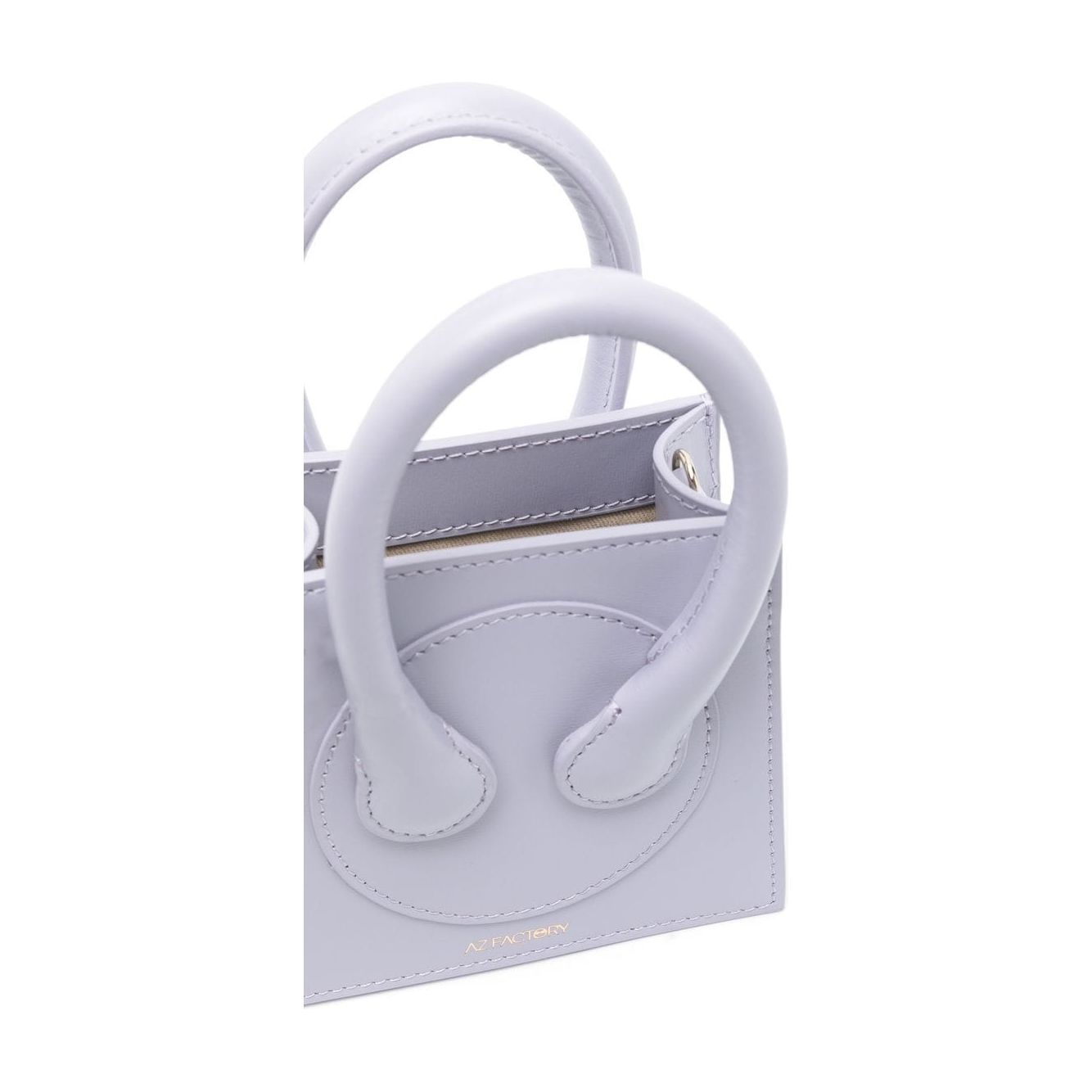 Front view with bag zipped and handles upright.