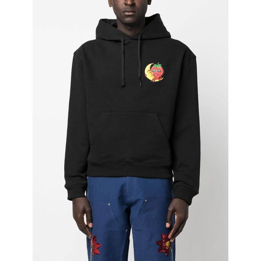 Black Sky High Farm hoodie with chest graphic print, drawstring hood, and single pocket; made from organic and recycled cotton.