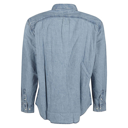 Lee Clear Blue denim shirt back view, medium-large size, features chest pocket with logo, true to size fit, model height 6ft 1in.