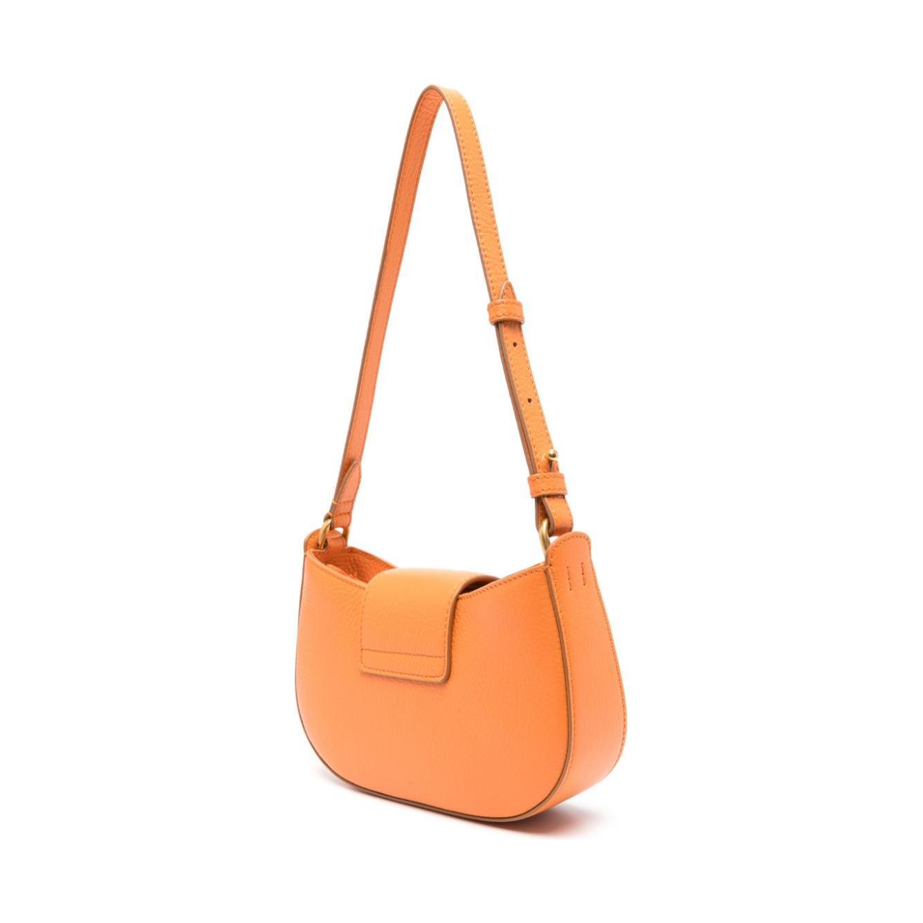 Front view with bag zipped and handles upright.