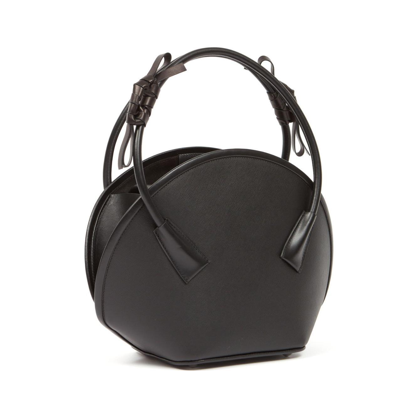 Front view with bag zipped and handles upright.