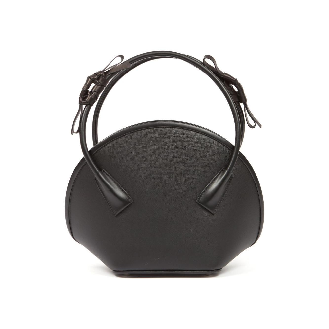 Front view with bag zipped and handles upright.