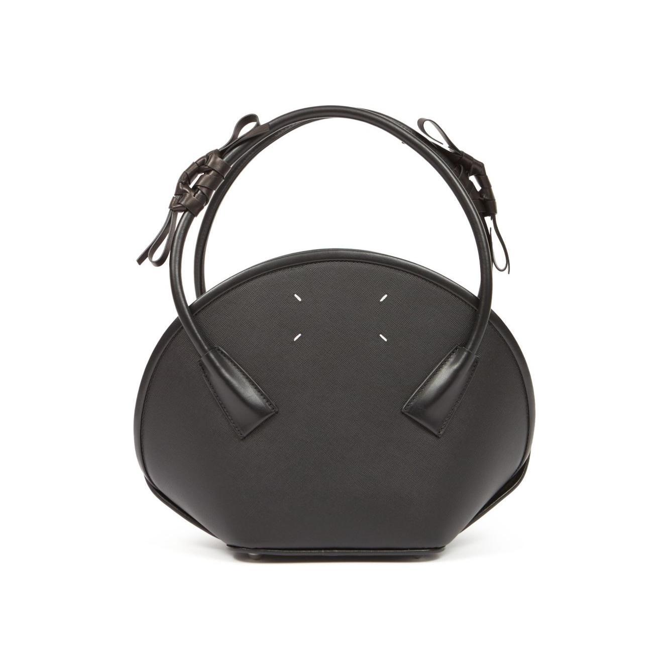 Front view with bag zipped and handles upright.