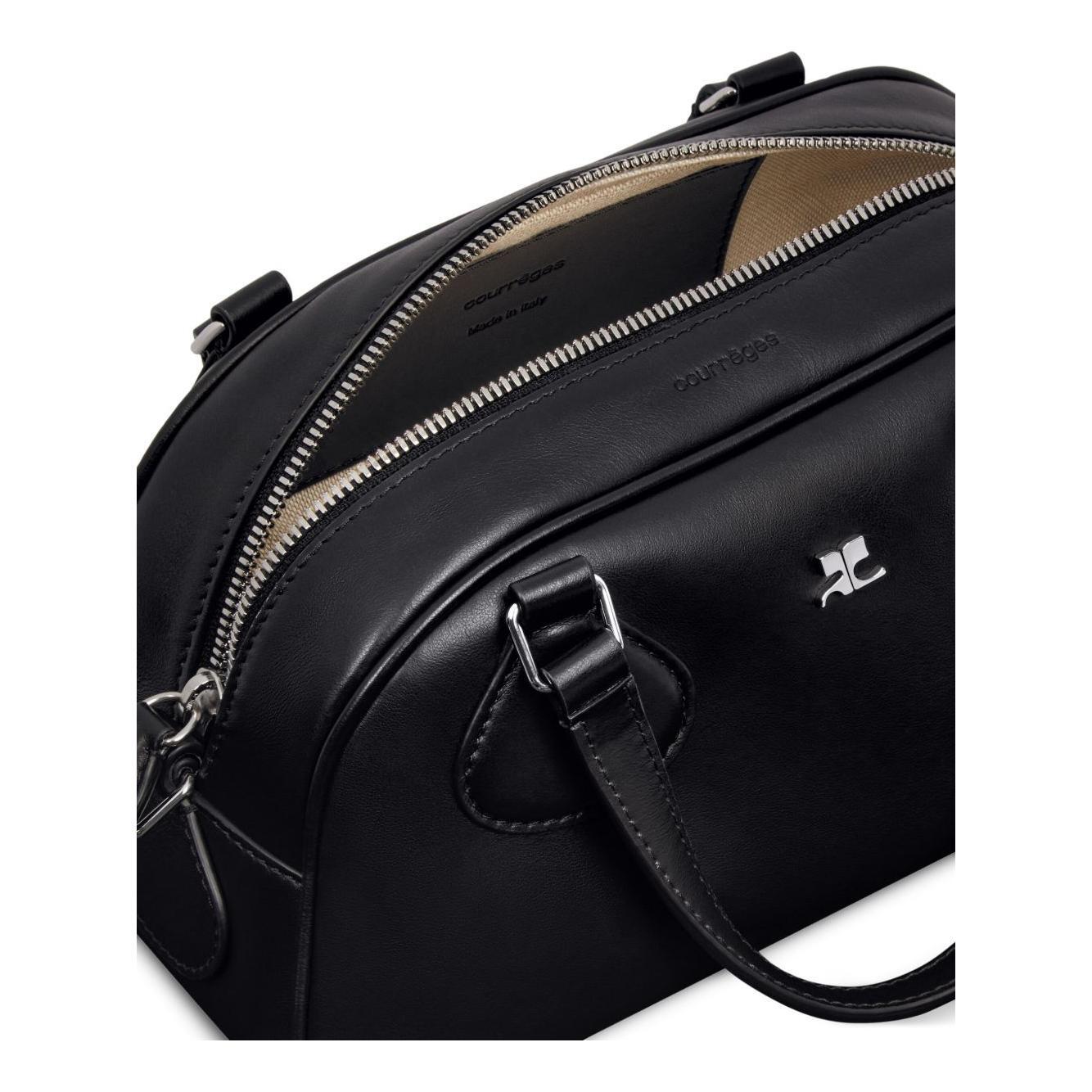Front view with bag zipped and handles upright.