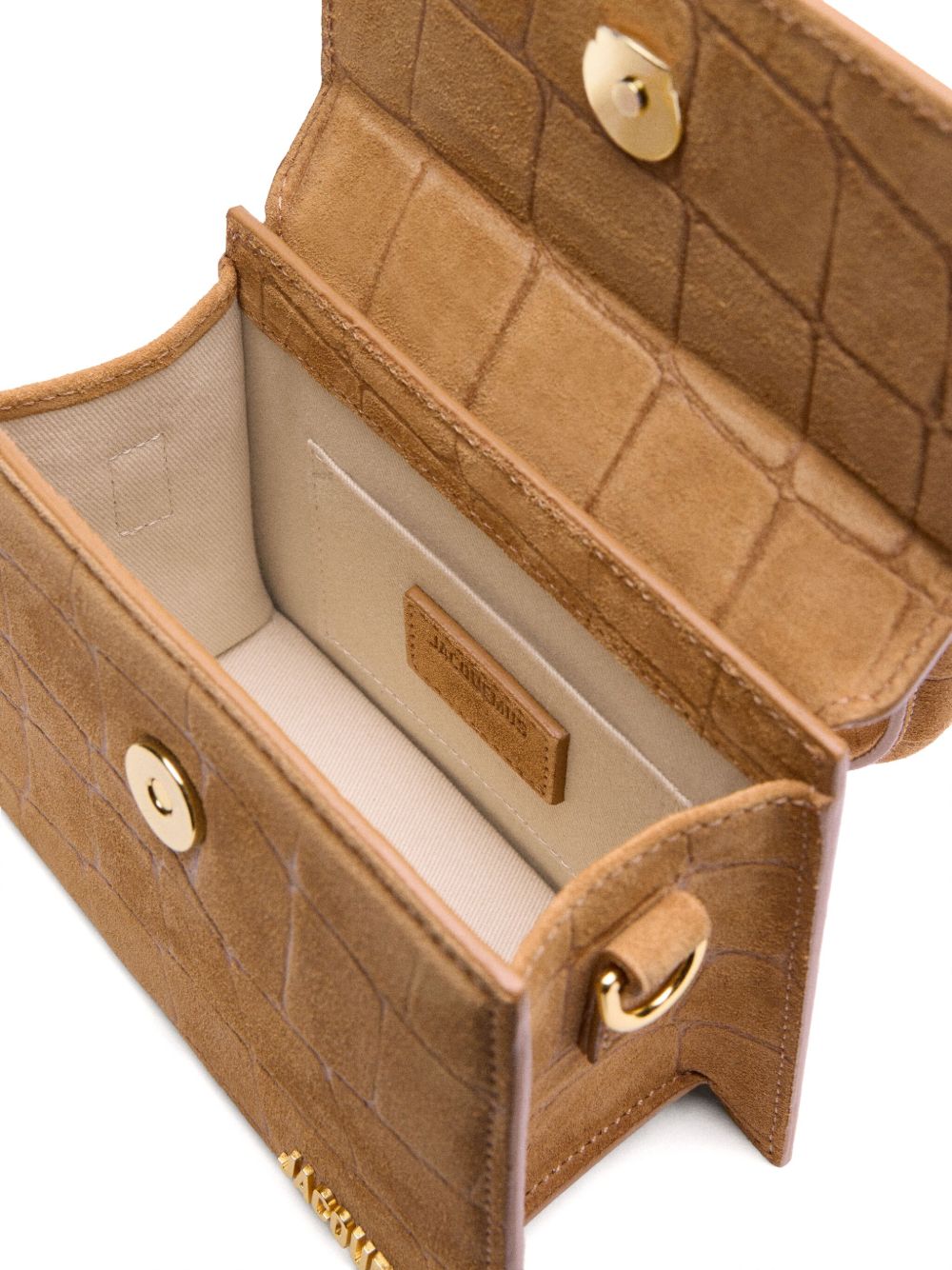 Front view with bag zipped and handles upright.