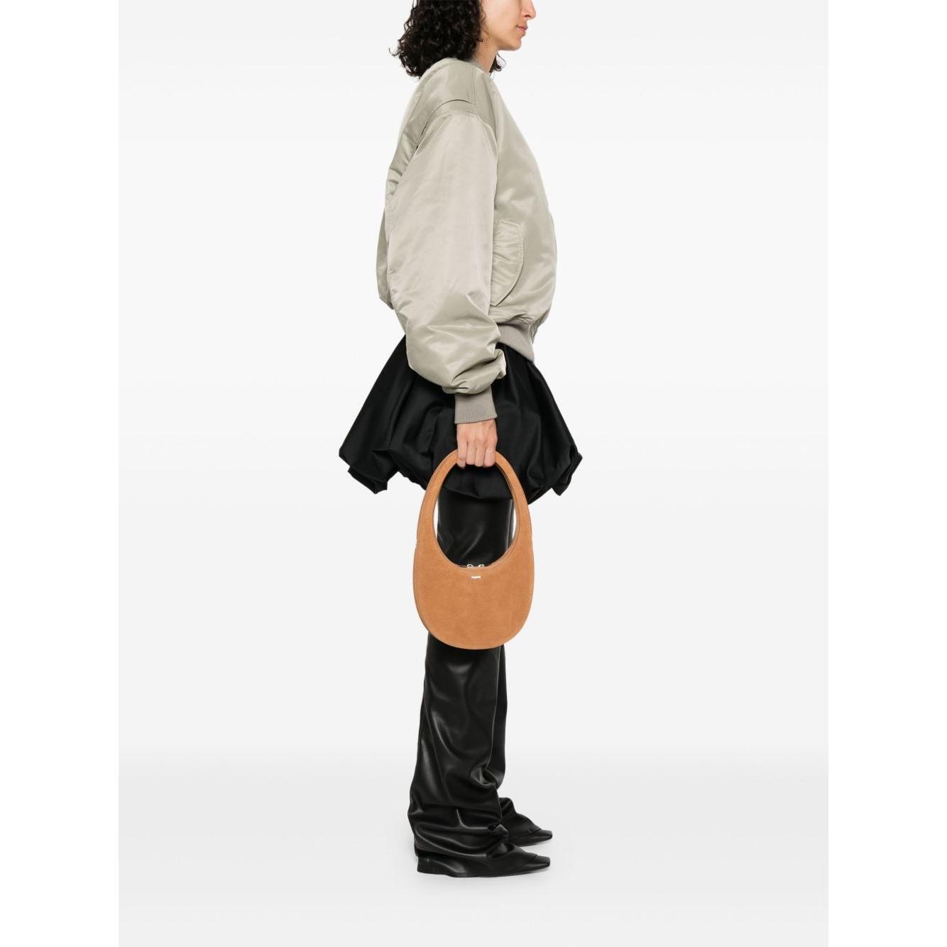 Front view with bag zipped and handles upright.