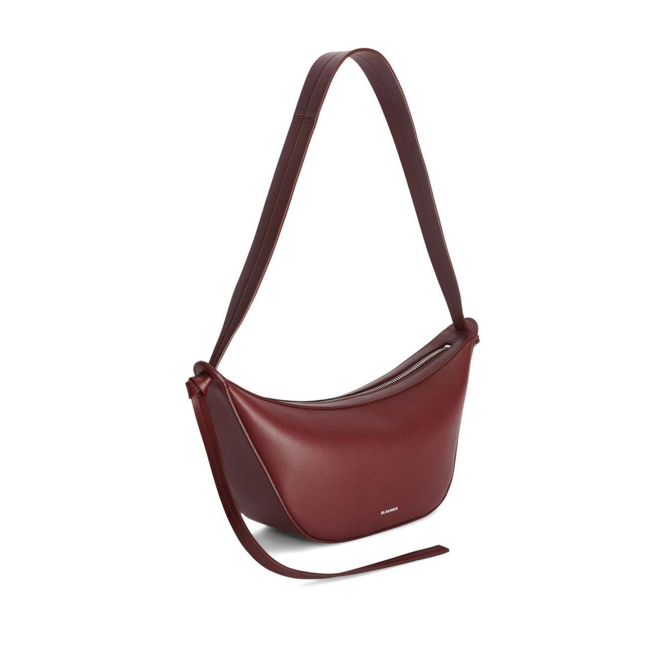 Front view with bag zipped and handles upright.