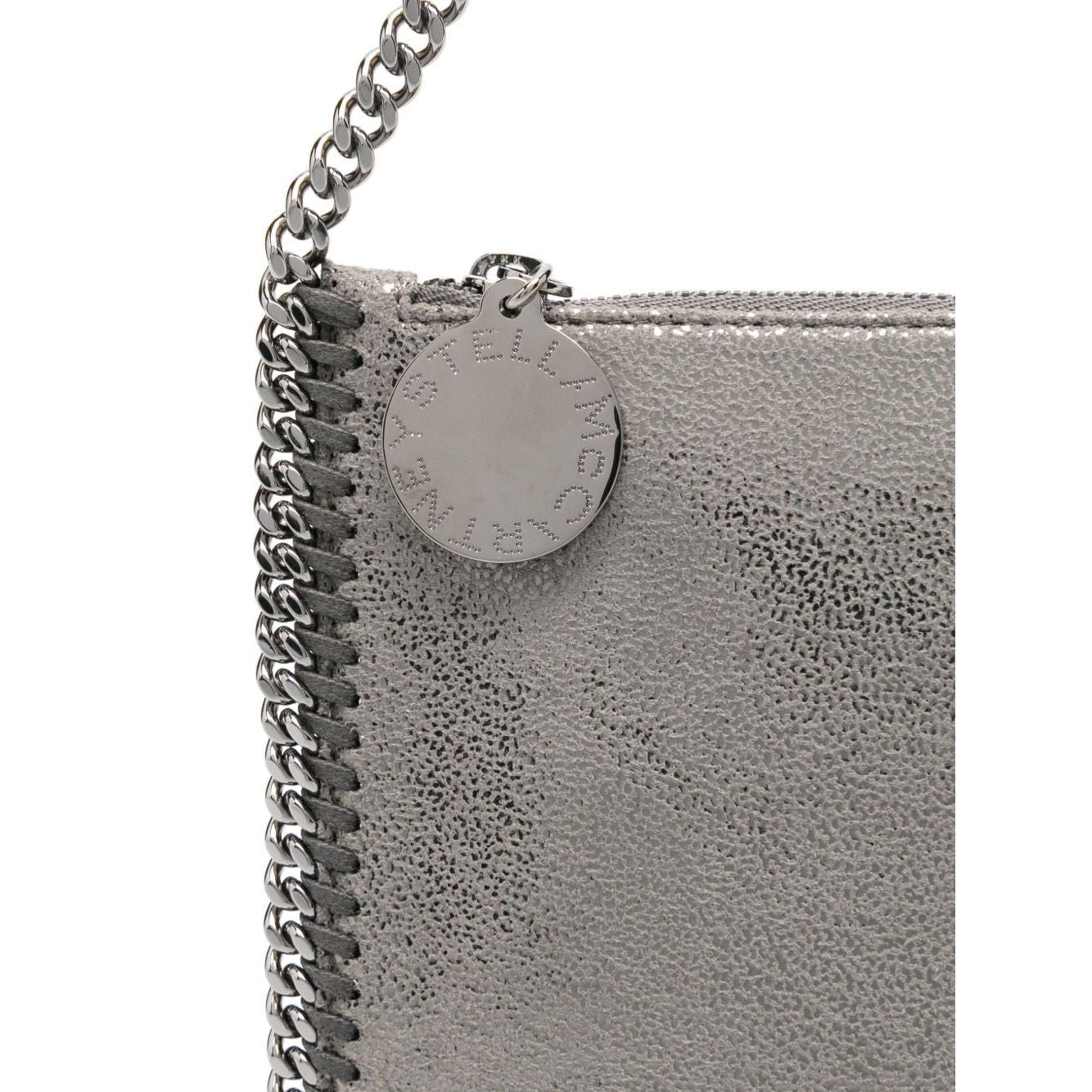 Front view with bag zipped and handles upright.