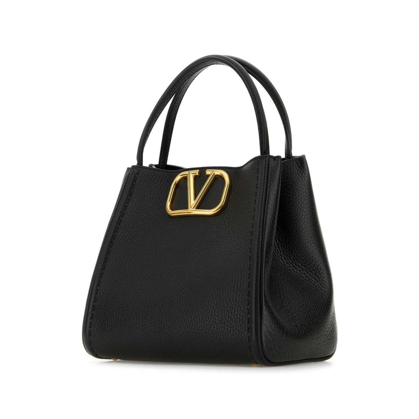 Front view with bag zipped and handles upright.