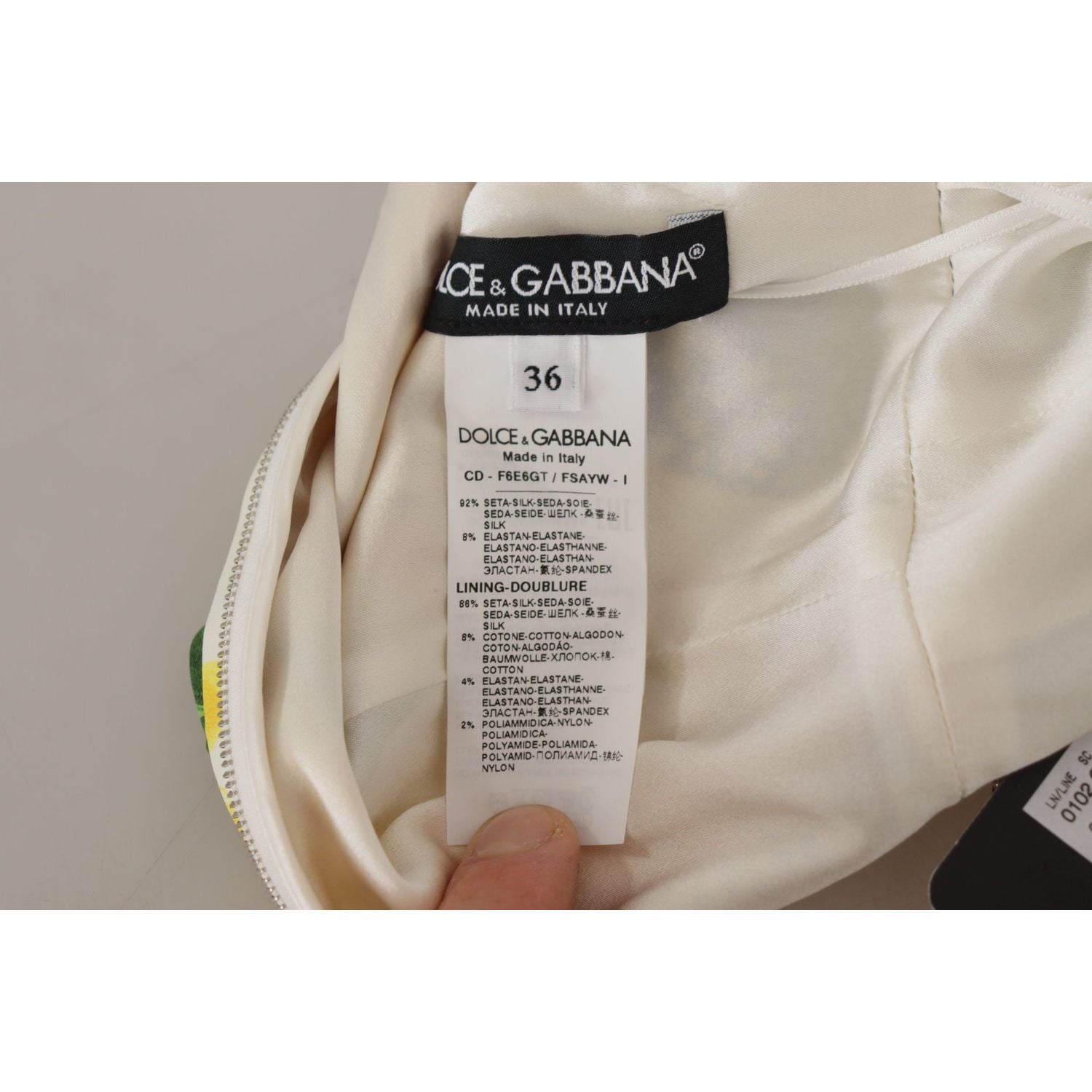 فستان ميدي أنيق بطبعة زهور باللون الأبيض من دولتشي آند غابانا