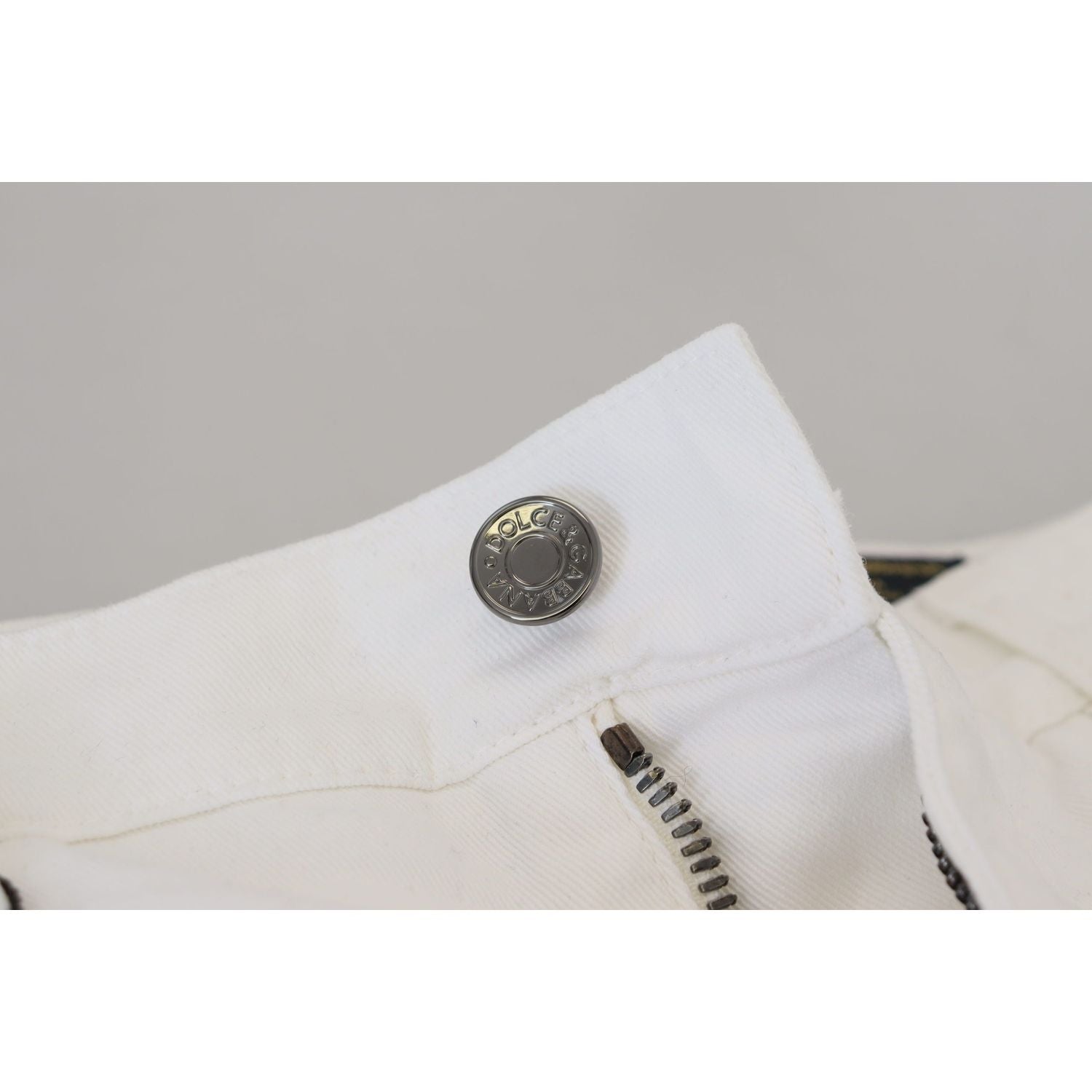 بنطلون جينز ضيق أنيق باللون الأبيض من دولتشي آند غابانا