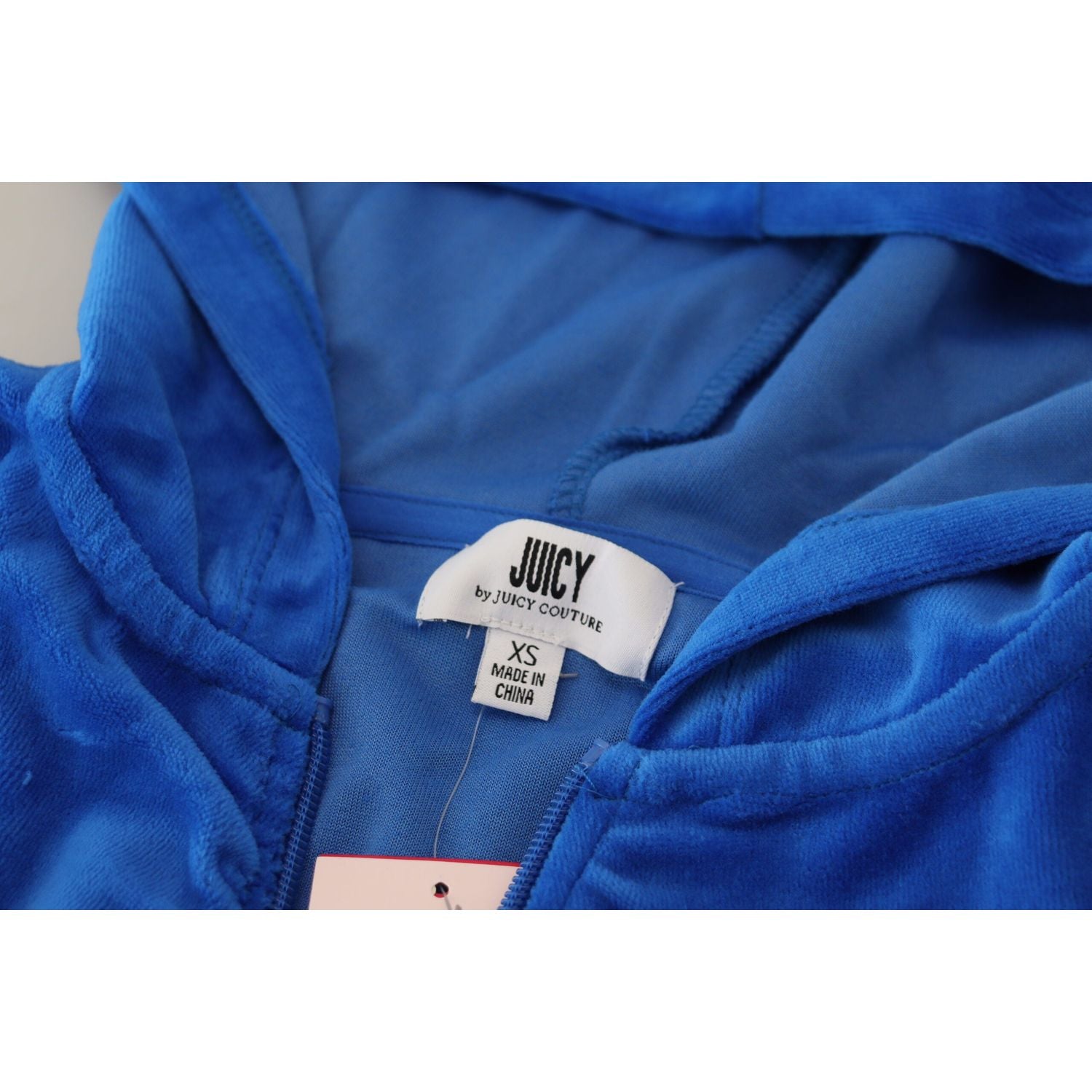 سترة Juicy Couture Glam ذات غطاء رأس وسحّاب مقصوصة باللون الأزرق