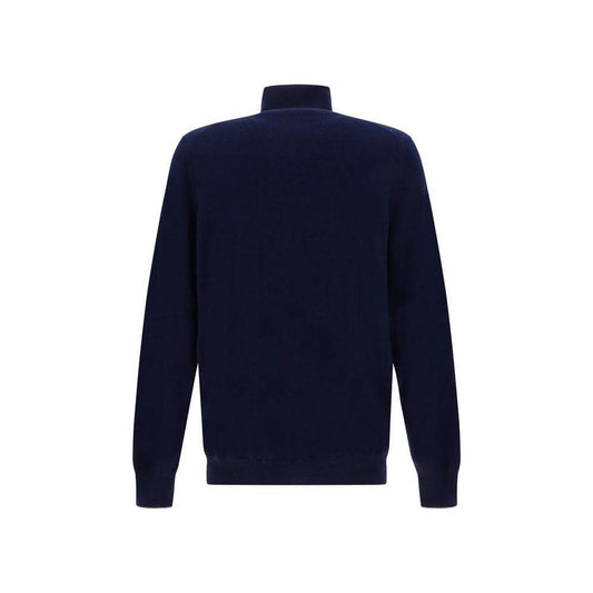 Back view of Brunello Cucinelli cashmere turtleneck sweater in navy blue with ribbed cuffs and hem.