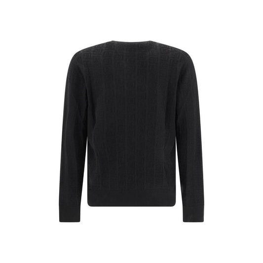 Back view of Dolce & Gabbana black silk sweater with ribbed collar, cuffs, and hem, featuring jacquard DG logo embellishments.