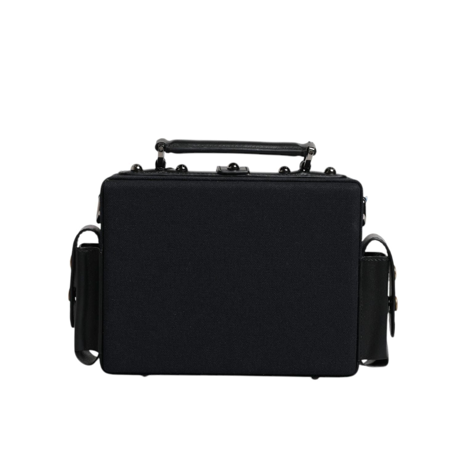 Front view with bag zipped and handles upright.