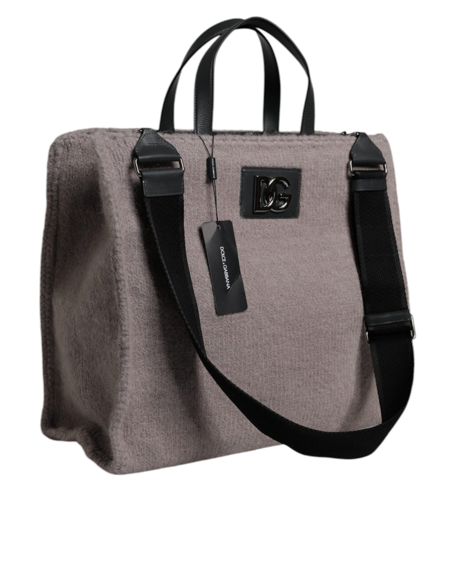 Front view with bag zipped and handles upright.