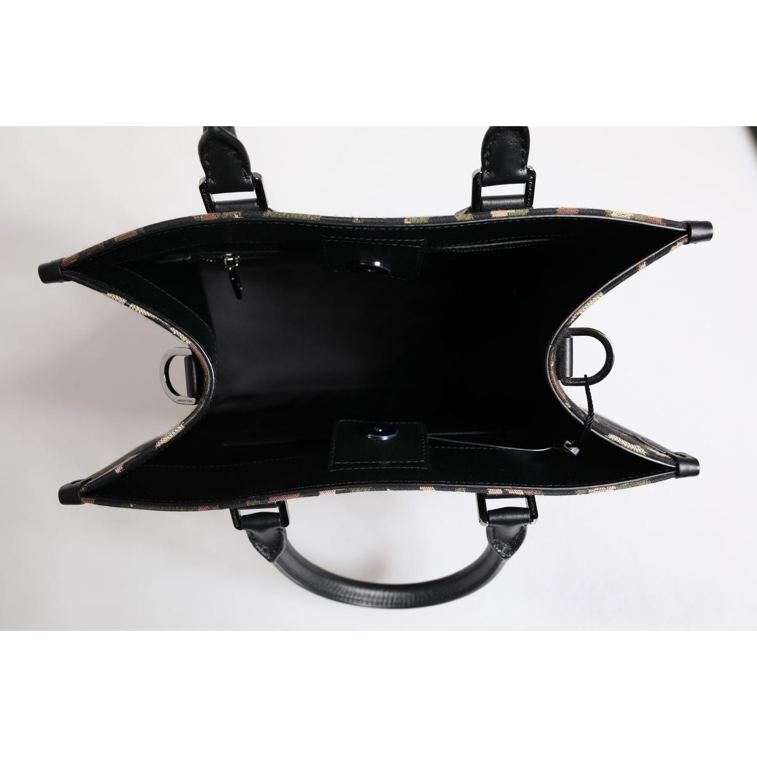 Front view with bag zipped and handles upright.
