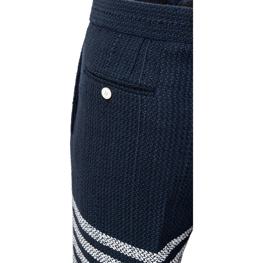 توم براون - ارتقِ بأسلوبك مع بنطلونات الأكريليك الأنيقة