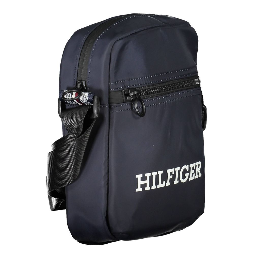 Front view with bag zipped and handles upright.
