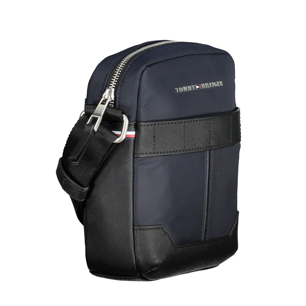 Front view with bag zipped and handles upright.
