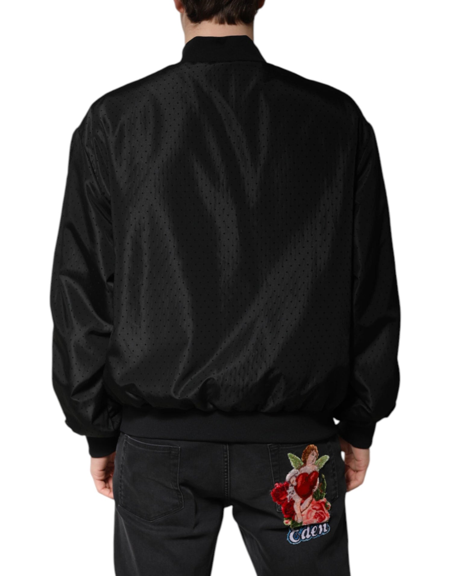 Front view with bag zipped and handles upright.