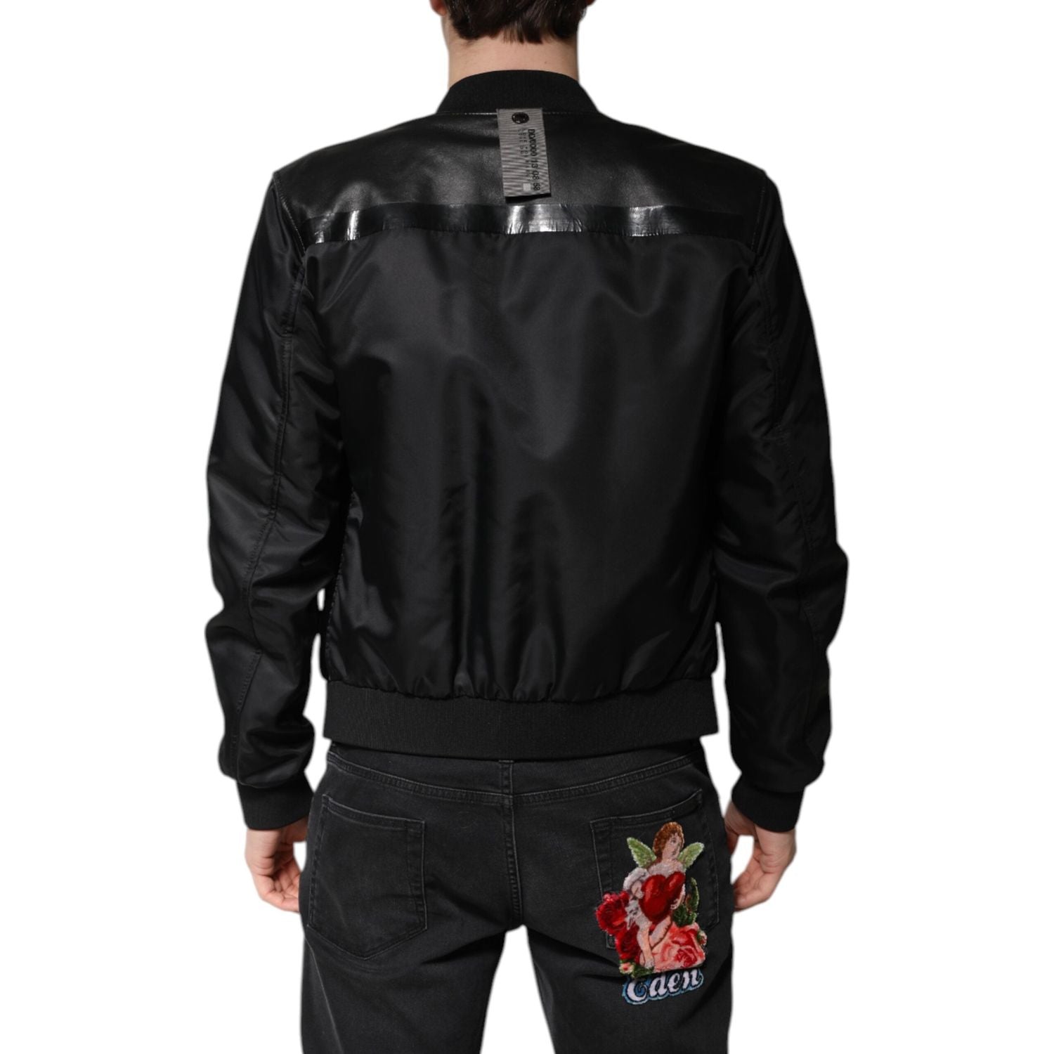 Front view with bag zipped and handles upright.