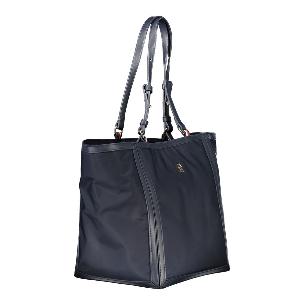 Front view with bag zipped and handles upright.