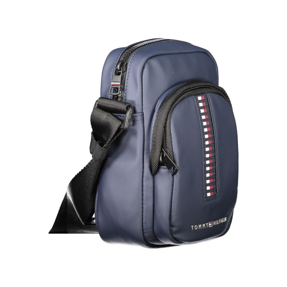 Front view with bag zipped and handles upright.