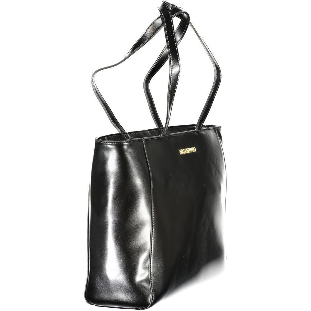 Front view with bag zipped and handles upright.