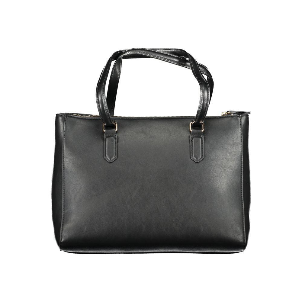 Front view with bag zipped and handles upright.