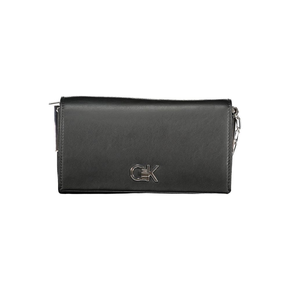 Calvin Klein Black Polyester Handbag with adjustable shoulder strap, contrasting details, and twist closure. Logo on front.