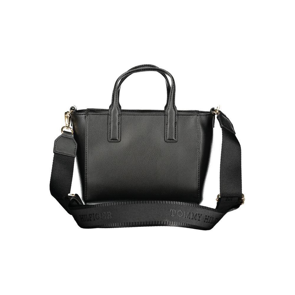 Front view with bag zipped and handles upright.