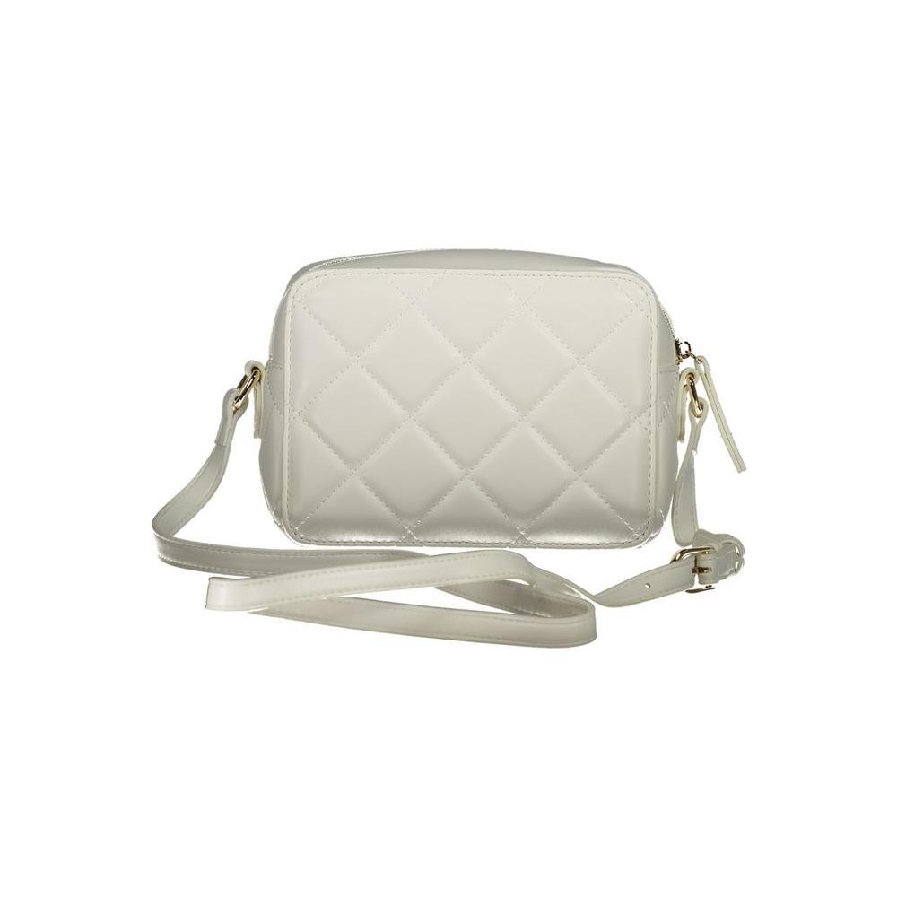 Front view with bag zipped and handles upright.