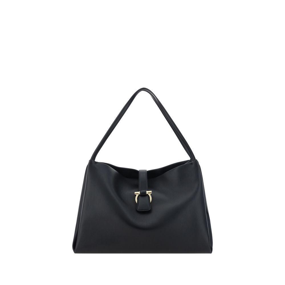 Front view with bag zipped and handles upright.