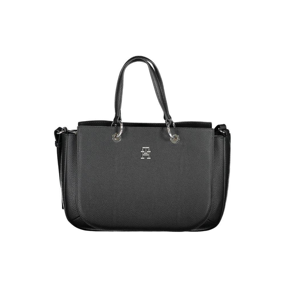 Front view with bag zipped and handles upright.