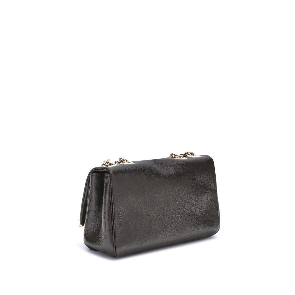 Front view with bag zipped and handles upright.
