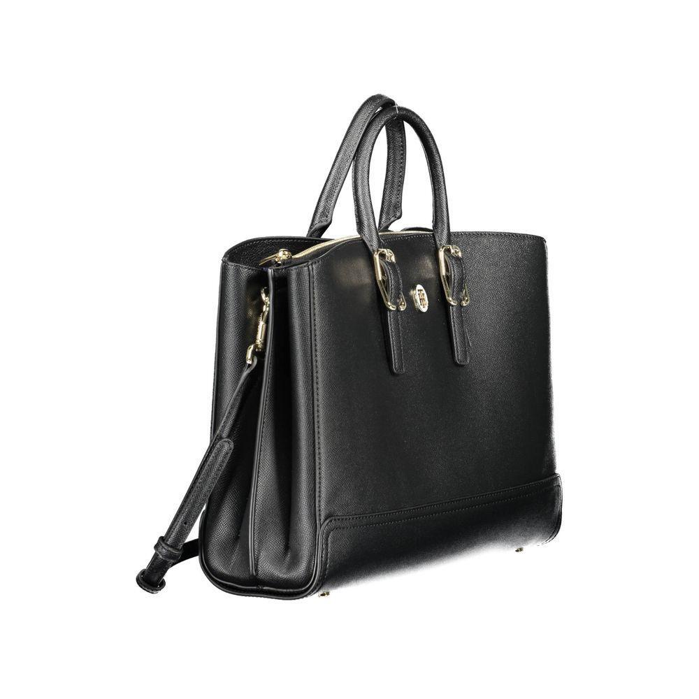 Front view with bag zipped and handles upright.