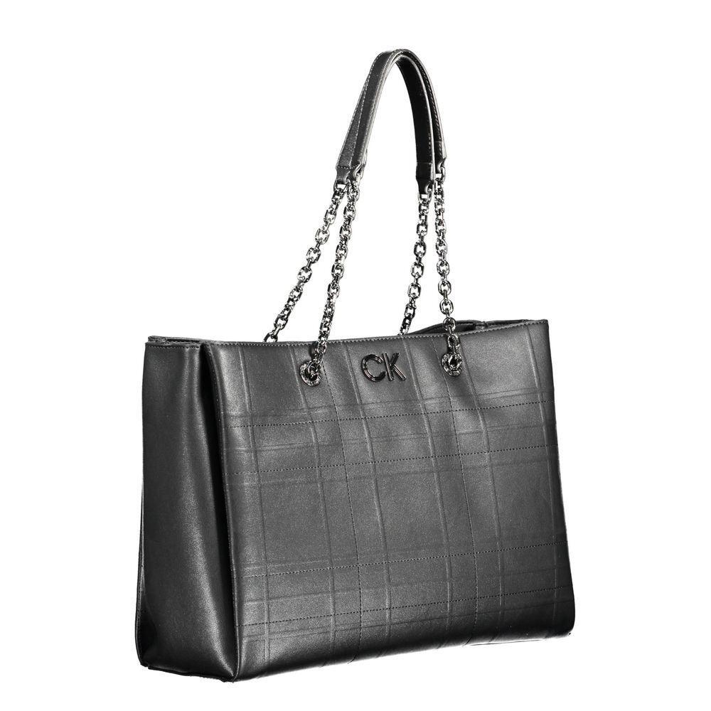 Front view with bag zipped and handles upright.