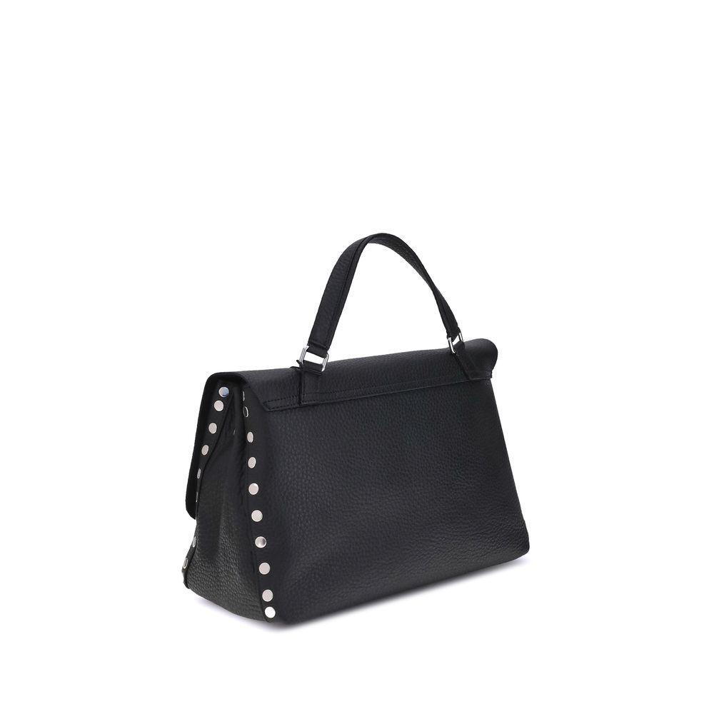 Front view with bag zipped and handles upright.