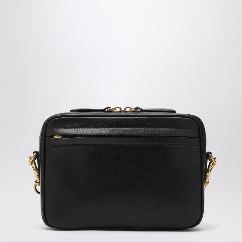 Front view with bag zipped and handles upright.