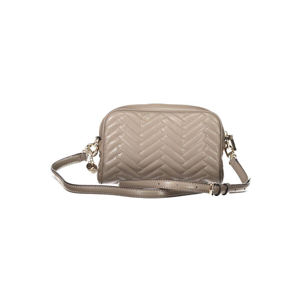 Front view with bag zipped and handles upright.