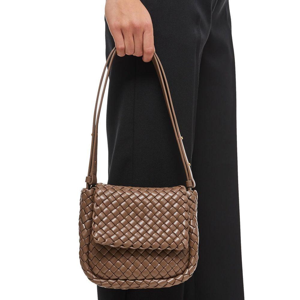 Front view with bag zipped and handles upright.